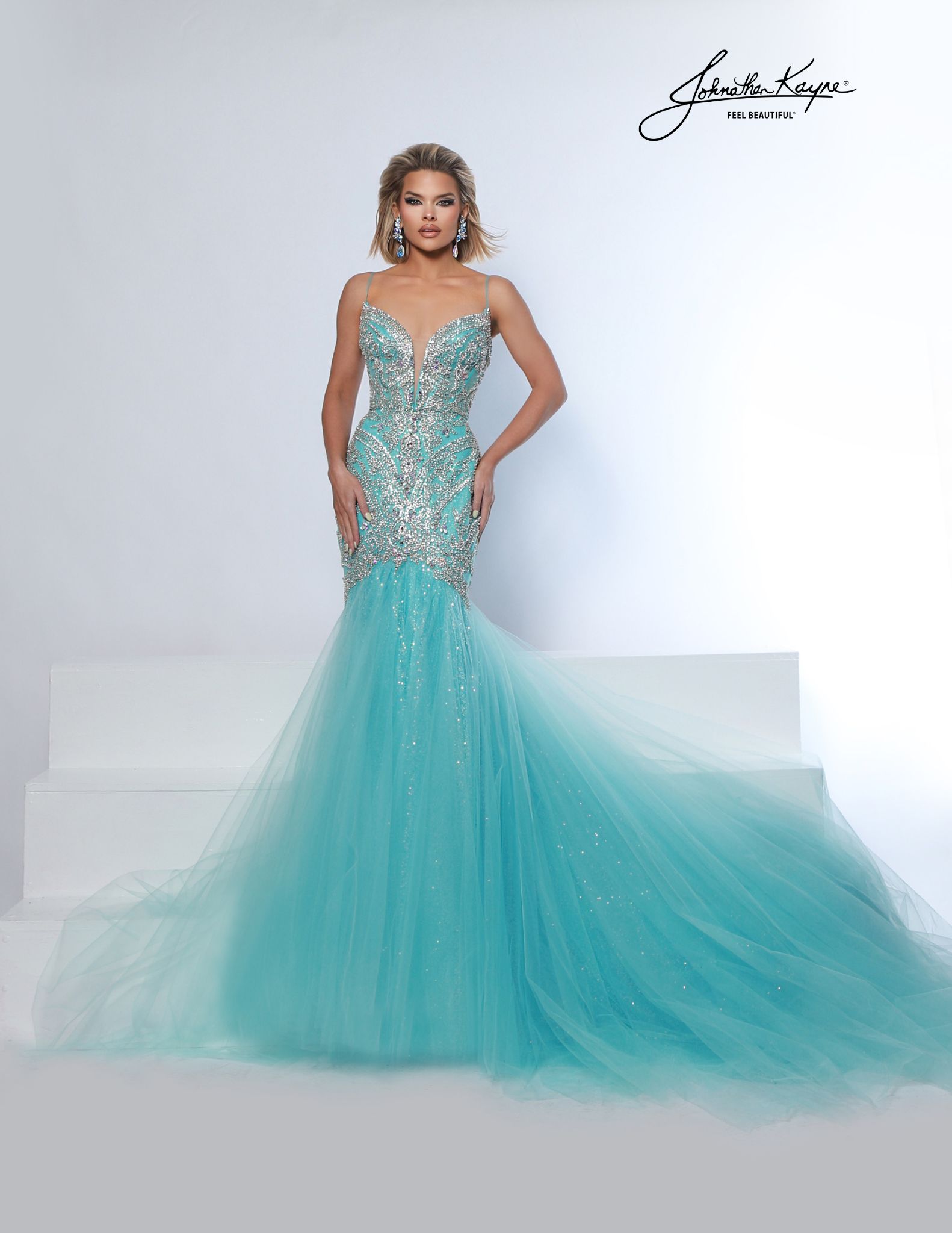 Aqua blue mermaid pageant gown with glitter sequin mesh skirt and intricate beading - perfect for pageants and red carpet events.